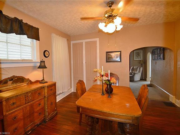 Laminate Floors compliment this large Dining Room.