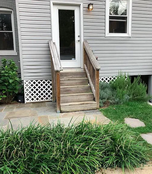 Dedicated, secure back yard with parking space. Great for grilling, herbs, relaxing!