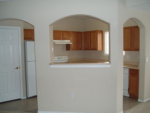 Walk through kitchen with breakfast bar