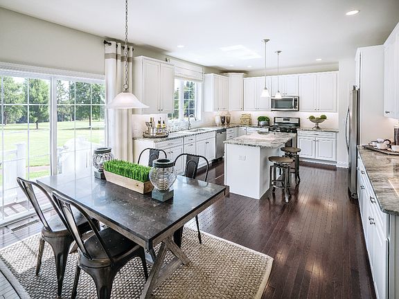 Kitchen with Center Island Open to Large Dining Area
