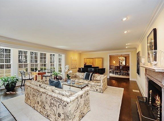 All rooms are south facing and gets excellent light. This over sized living room / great room offers