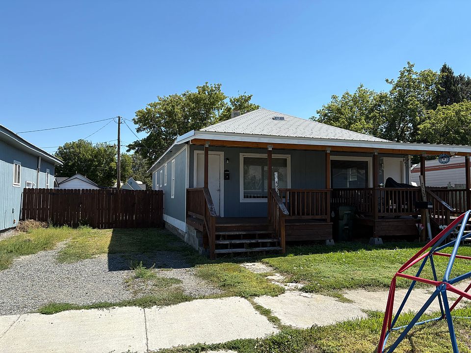 Exterior with parking and covers porch