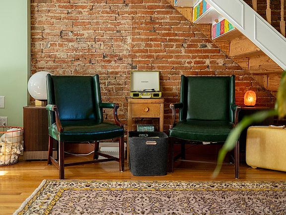 _____ Chill out and relax while listening to records on the turntable, grab a nip from the bar cart.

The staircase leads to the 3rd floor, where the bedroom and full bathroom rerside.