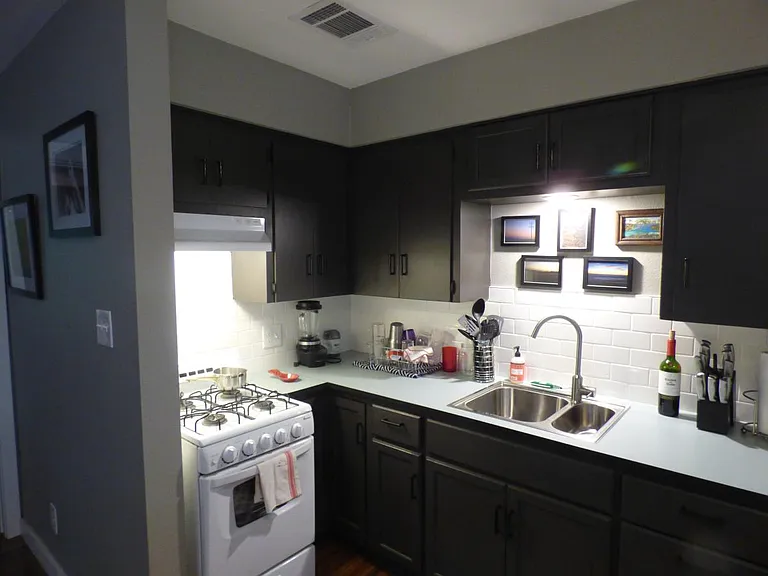 PLENTY OF LIGHT FIXTURES IN KITCHEN