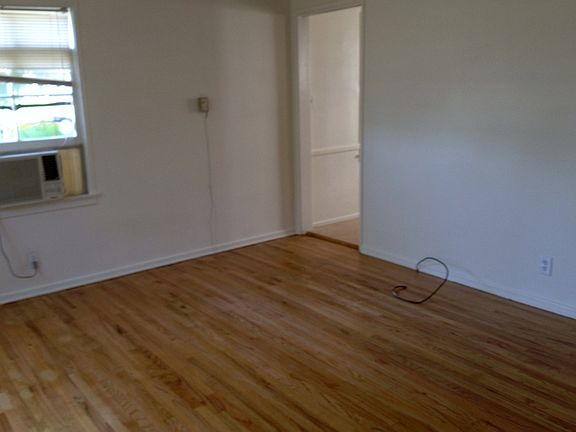 REDONE FLOOR IN LIVING ROOM