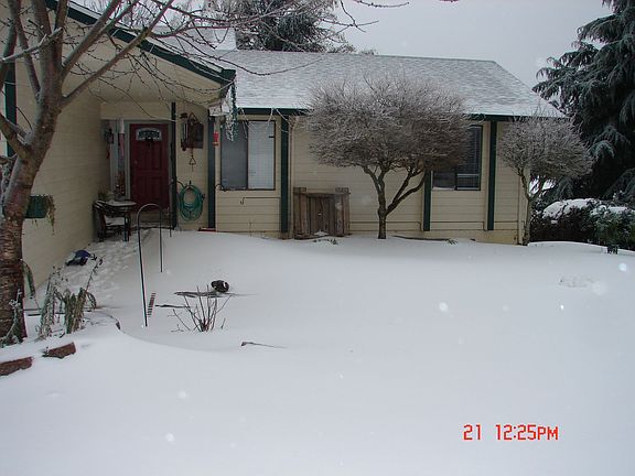 Front of our house under all the snow!