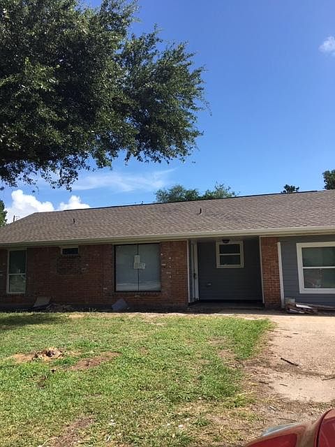 This picture shows the front of the house with the brand new roof