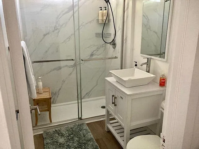 Newly updated bathroom with big shower.