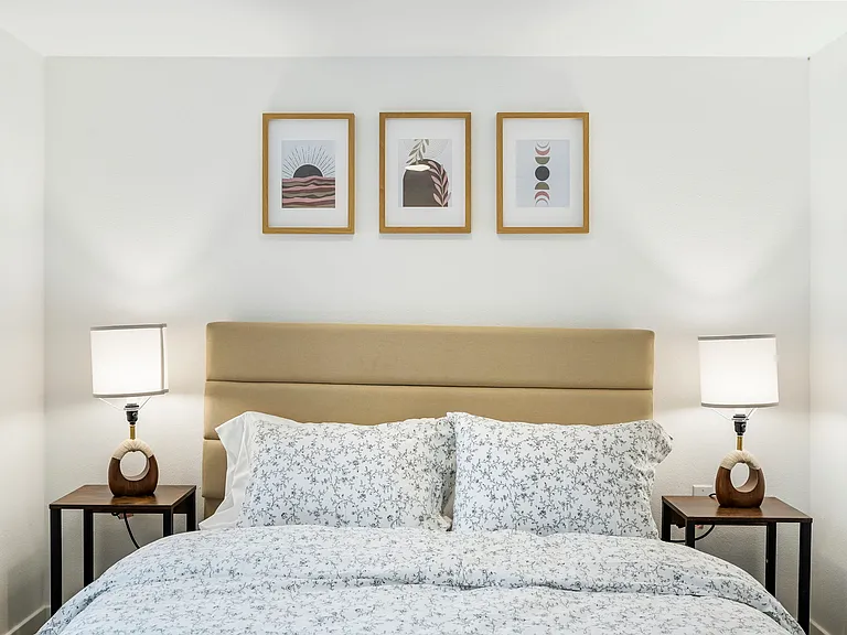 Queen Bedroom connected to bathroom.
