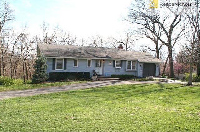 Updated 3 bedroom ranch sits high on a hill overlooking 1.3 acre wooded lot.  Large circle drive and large out-building with plenty of storage.