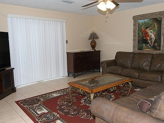 OPEN LIVING AREA WELCOMES YOU HOME.