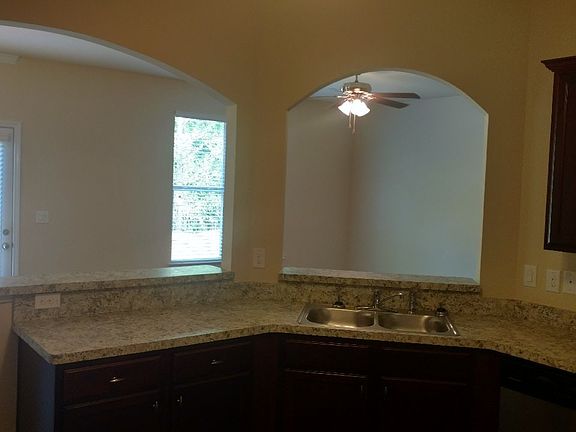 Kitchen opens to living area