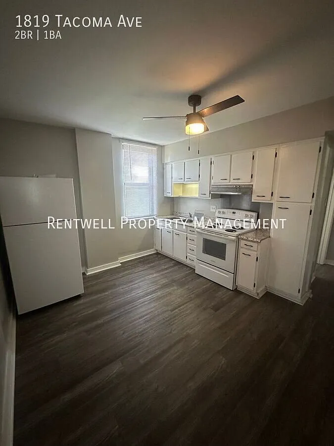 Updated 2-Bedroom Apartment with Modern Finishes — Photo 2