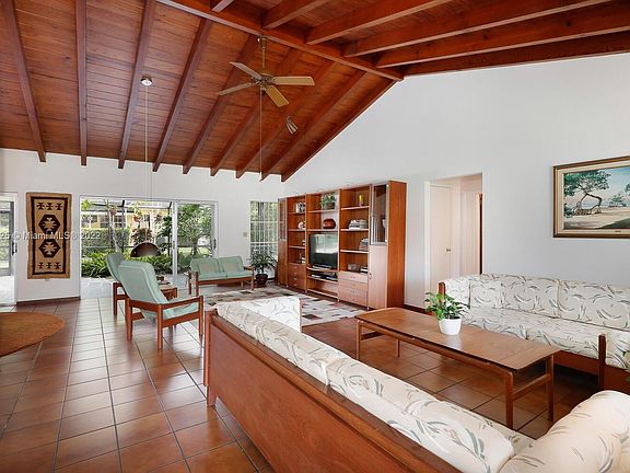 Entrance area/ A large living room with beautiful wood ceiling.