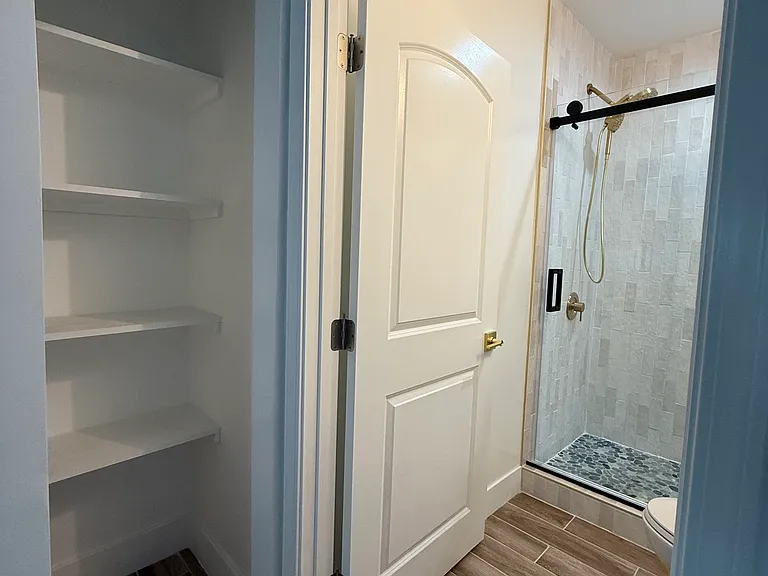 Pantry/household supply shelves.