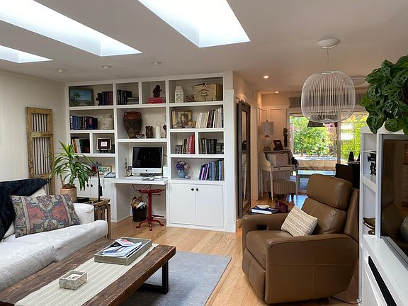 Book shelves in living room/TV to right