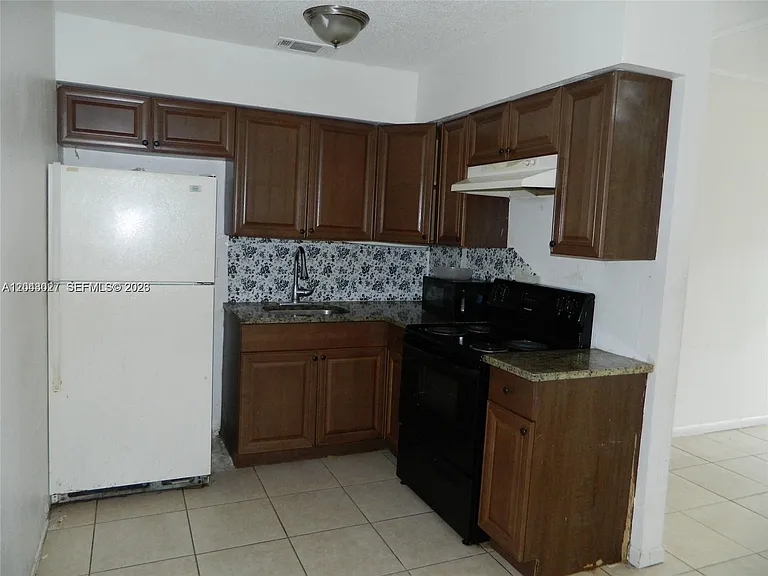 1890 NW 58th Ter #2 — Photo 4
