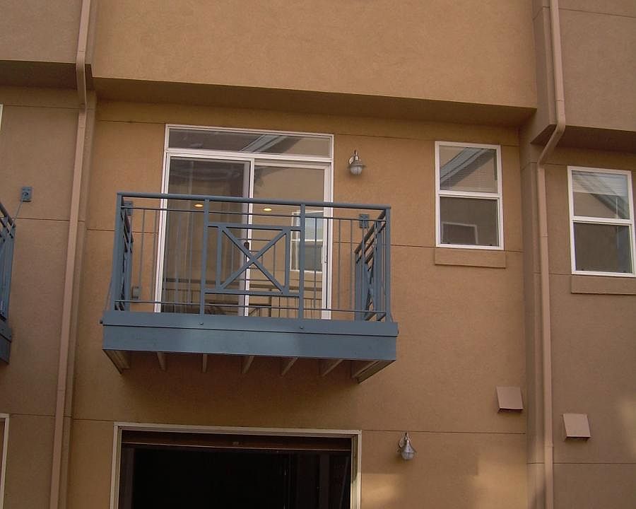 Back entrance with garage