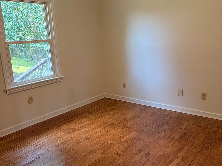 2nd bedroom with hardwood floors