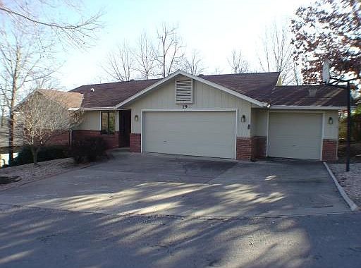 3 car garage and level driveway