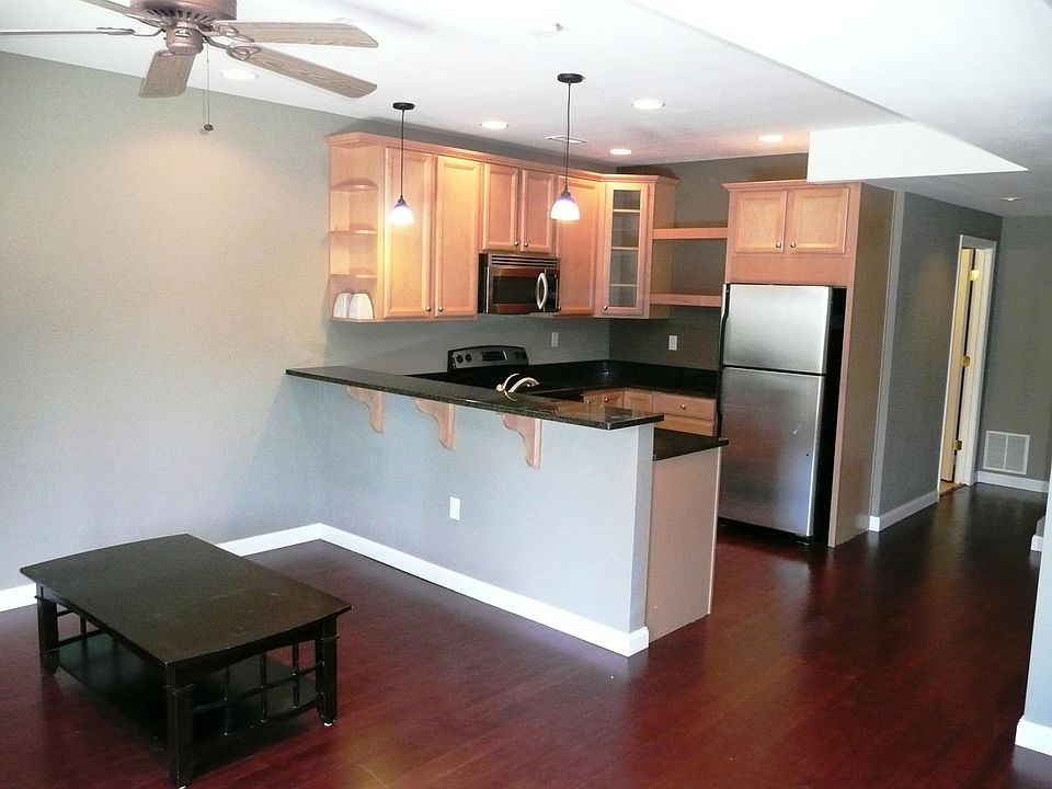 High-end kitchen featuring granite and stainless steel appli