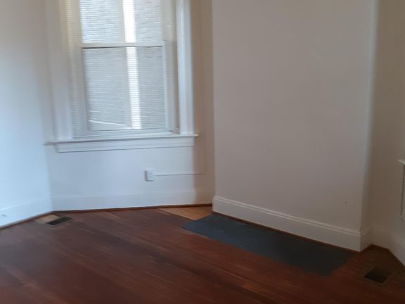Large Living Room. Lots of natural light and ceiling fan.