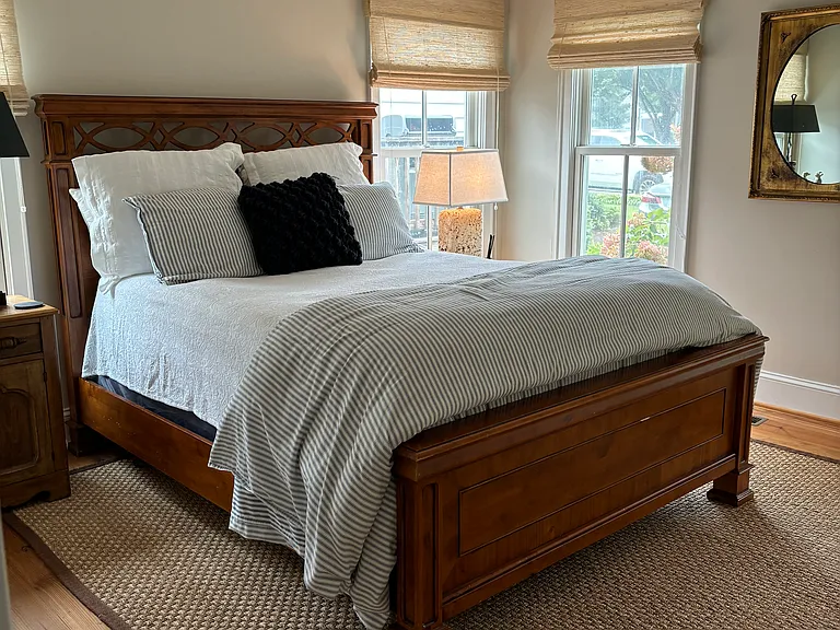 Downstairs master bedroom with attached private bath and walk in closet