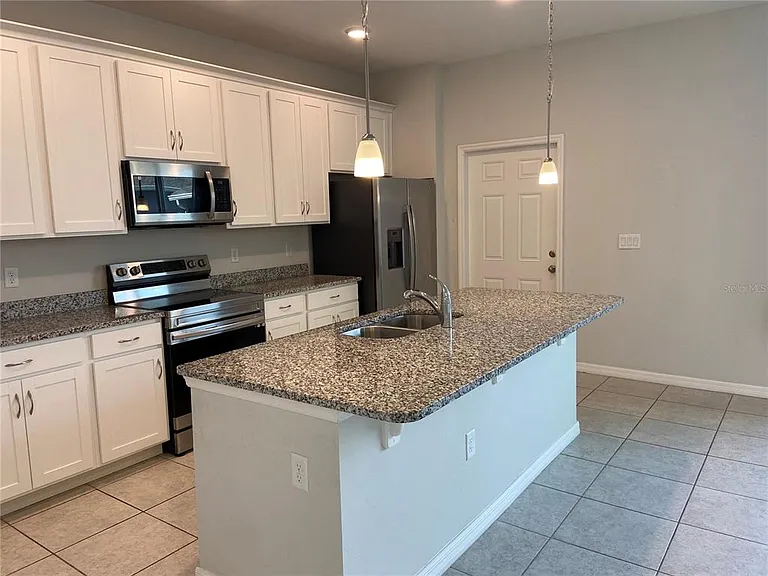 5029 Avalon Park Blvd — Photo 8