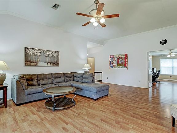 Living Room Looking Towards Study With Double French Doors.
