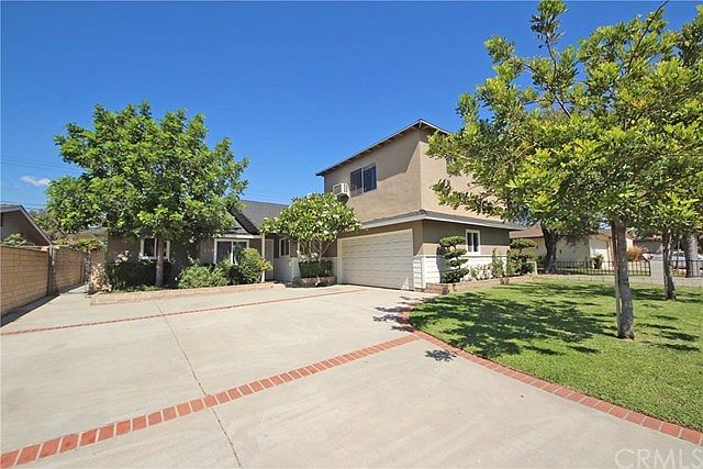 Beautiful south-facing home with a long driveway
