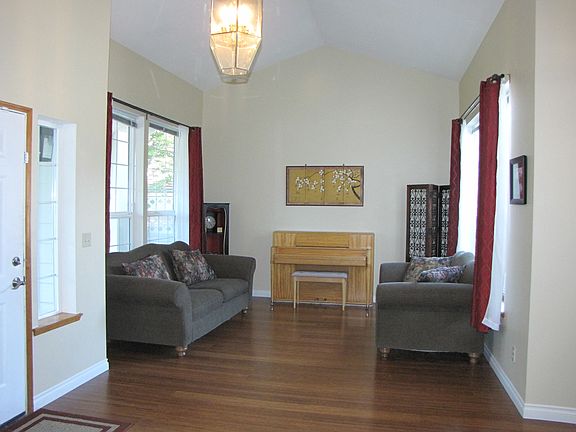 Living room with vaulted ceilings