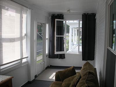 Enclosed front porch, great for afternoon naps.