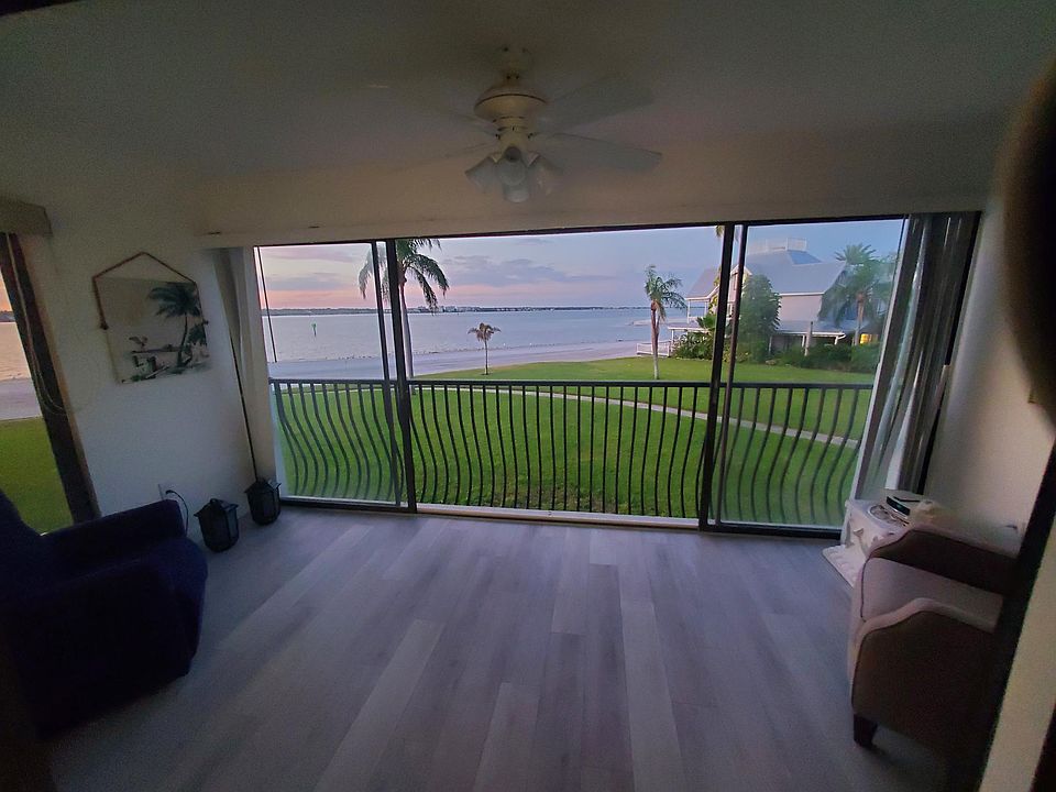 Florida room woth sliding doors to private beach