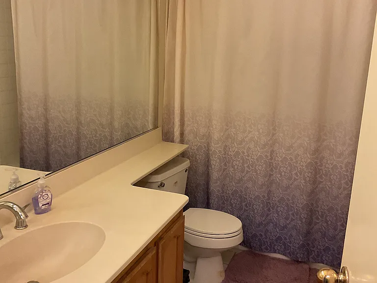 Hall way bath with tub