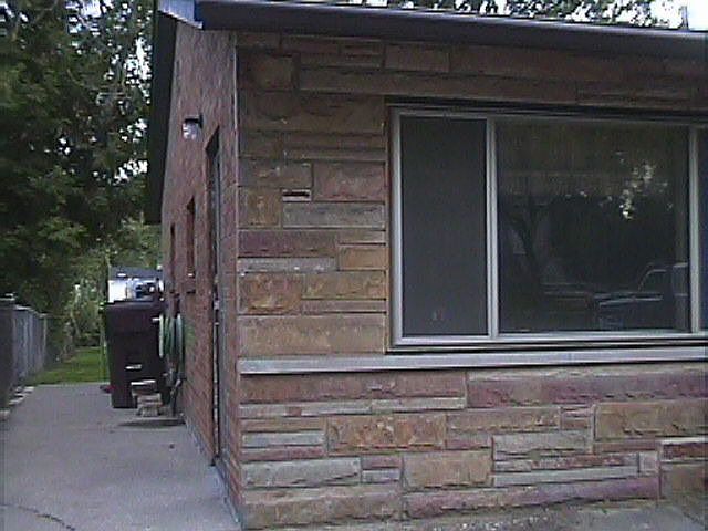 Side view leads to back yard