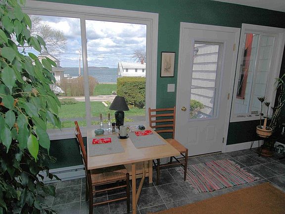 All-season sunroom looking onto beach