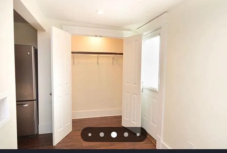Coat closet in the mudroom/laundry area next to back entrance.