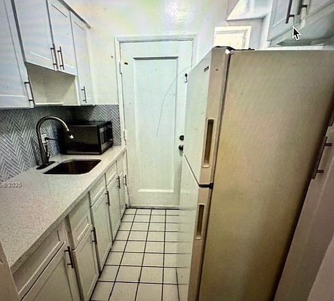 Amazing Kitchen with quartz countertops and tile backsplash