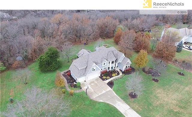 Private 1.6 acre lot with heavily wooded lot behind