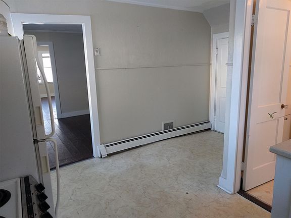 kitchen with view of bathroom, bedroom