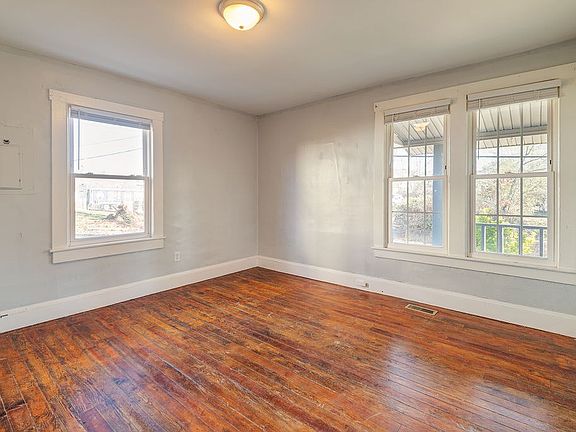 Front right bedroom, opens to living room and kitchen
