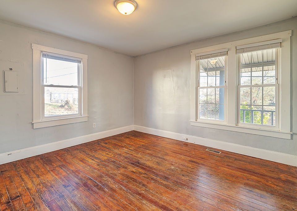 Front right bedroom, opens to living room and kitchen