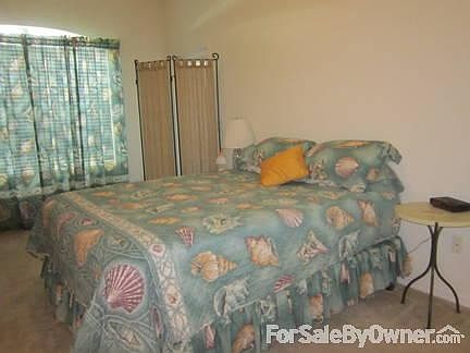 Master bedroom with exit to lanai
						:
						large bedroom