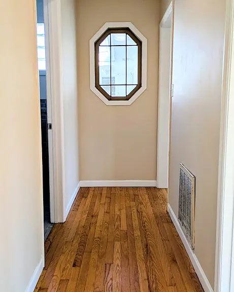 Hallway by the primary and secondary bedrooms.