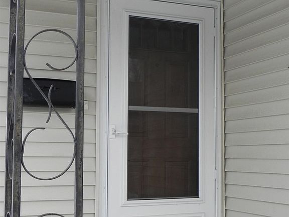 Enter over a covered porch