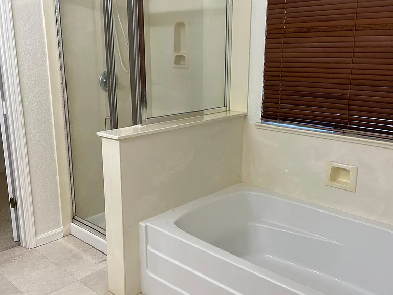 Master bathroom with shower and tub