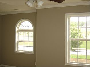 MASTER BEDROOM W/SITTING AREA AS SEEN ABOVE LEFT
