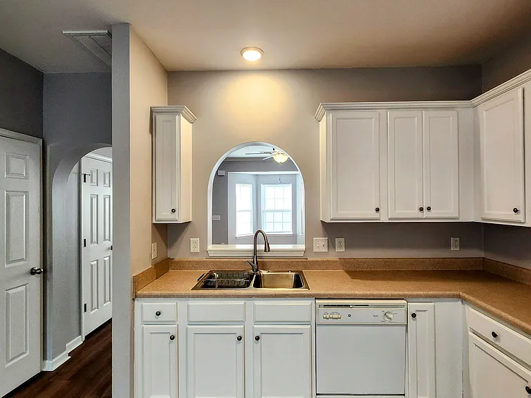 Kitchen with new kitchen sink and garbage disposal