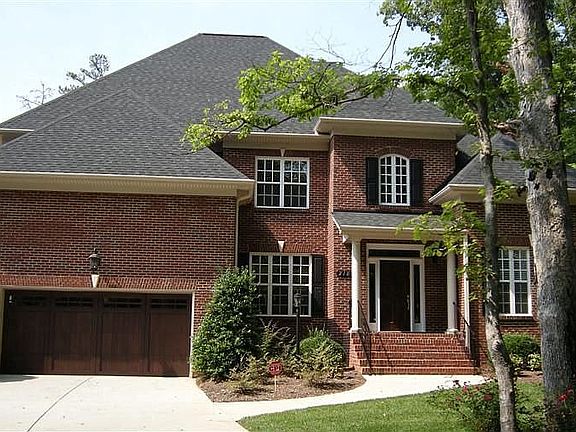  Mature hardwoods compliment the front yard 