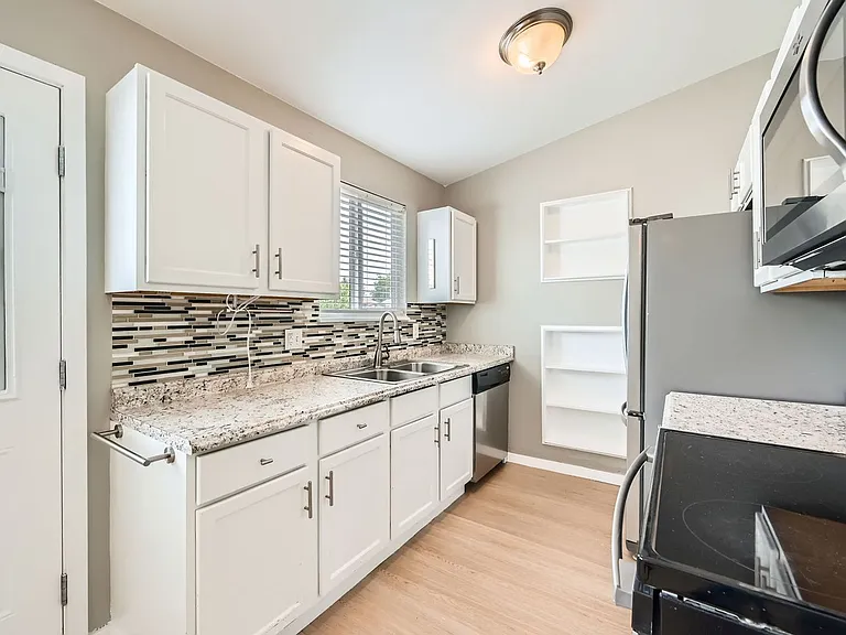 17166 E Nassau Pl — Photo 3